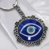 Creative blue evil eye key pendant, personalized anti-loss key chain, fashionable and trendy accessories, gift items, keychain accessories, keychain rings, keychain rings, keychain accessories, keychains Application Scenario